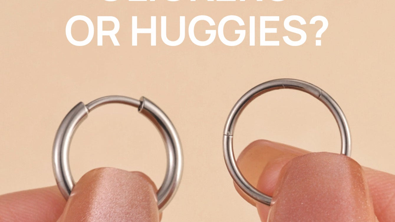 Comparison of clicker and huggie hoop earrings held between fingers showing closure mechanisms and design differences