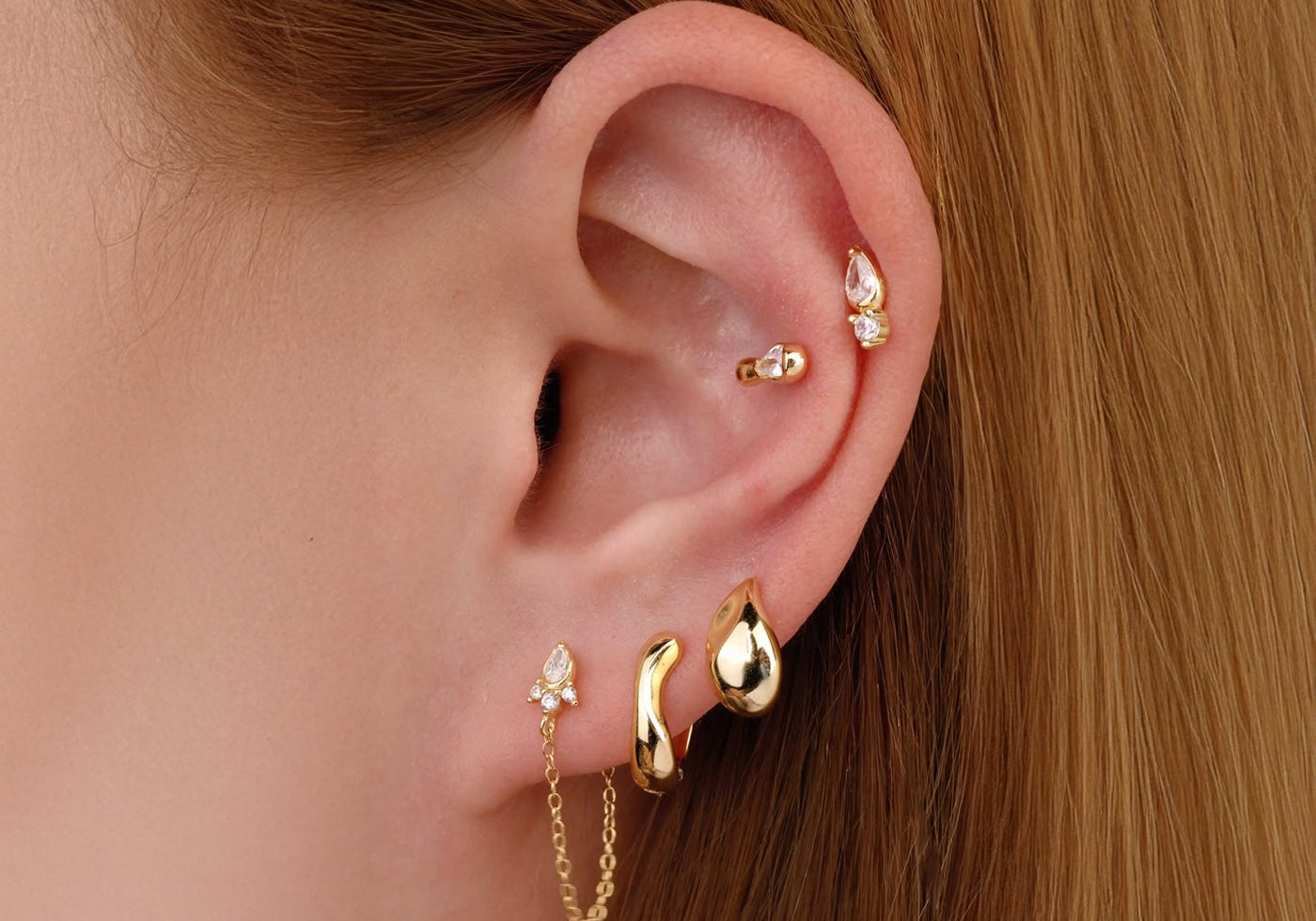 How to Style Multiple Ear Piercings: A Complete Guide