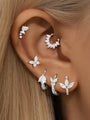 18k gold plated sterling silver earring set with butterfly & leaf CZ designs on ear.