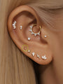 14K solid gold glossy simple lightning bolt ear piercing stud with flat back post.
