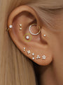 14K yellow gold flatback stud with 3.6mm brilliant-cut cubic zirconia for ear piercing.