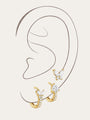 Gold-plated sterling silver earring set with butterfly stud and two CZ hoop earrings, showcasing dazzling sparkle.