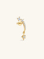 Angled view of KOSINER Rising Star gold-plated star earring showing clear stones, a dangling star and butterfly back