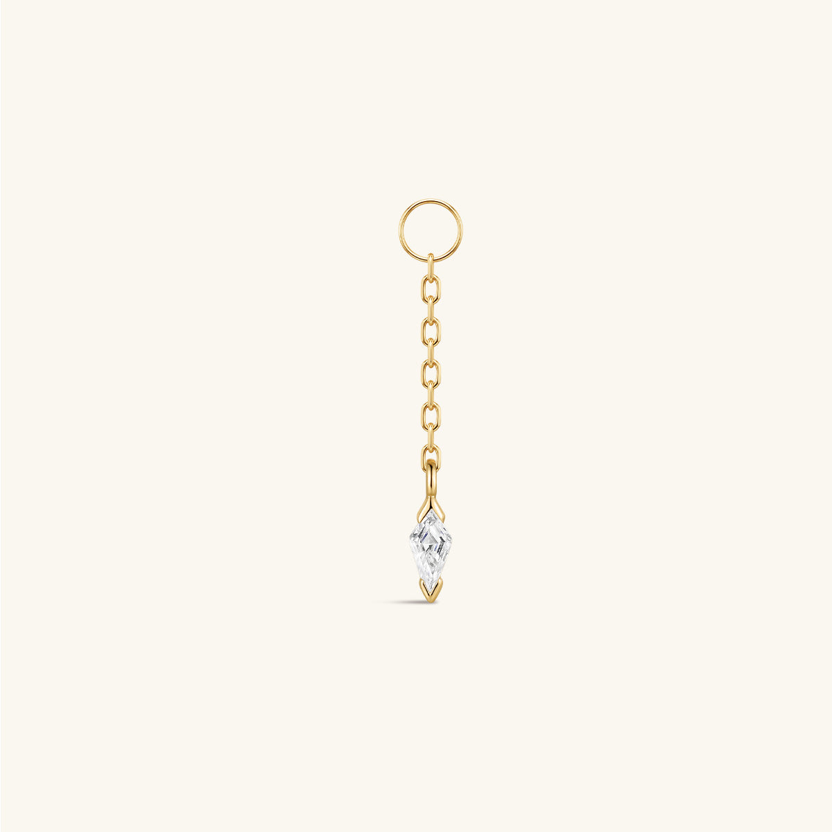 14K solid gold kite drop detachable charm, long chain with kite cut CZ pendant, ear hoop accessory on cream neutral background