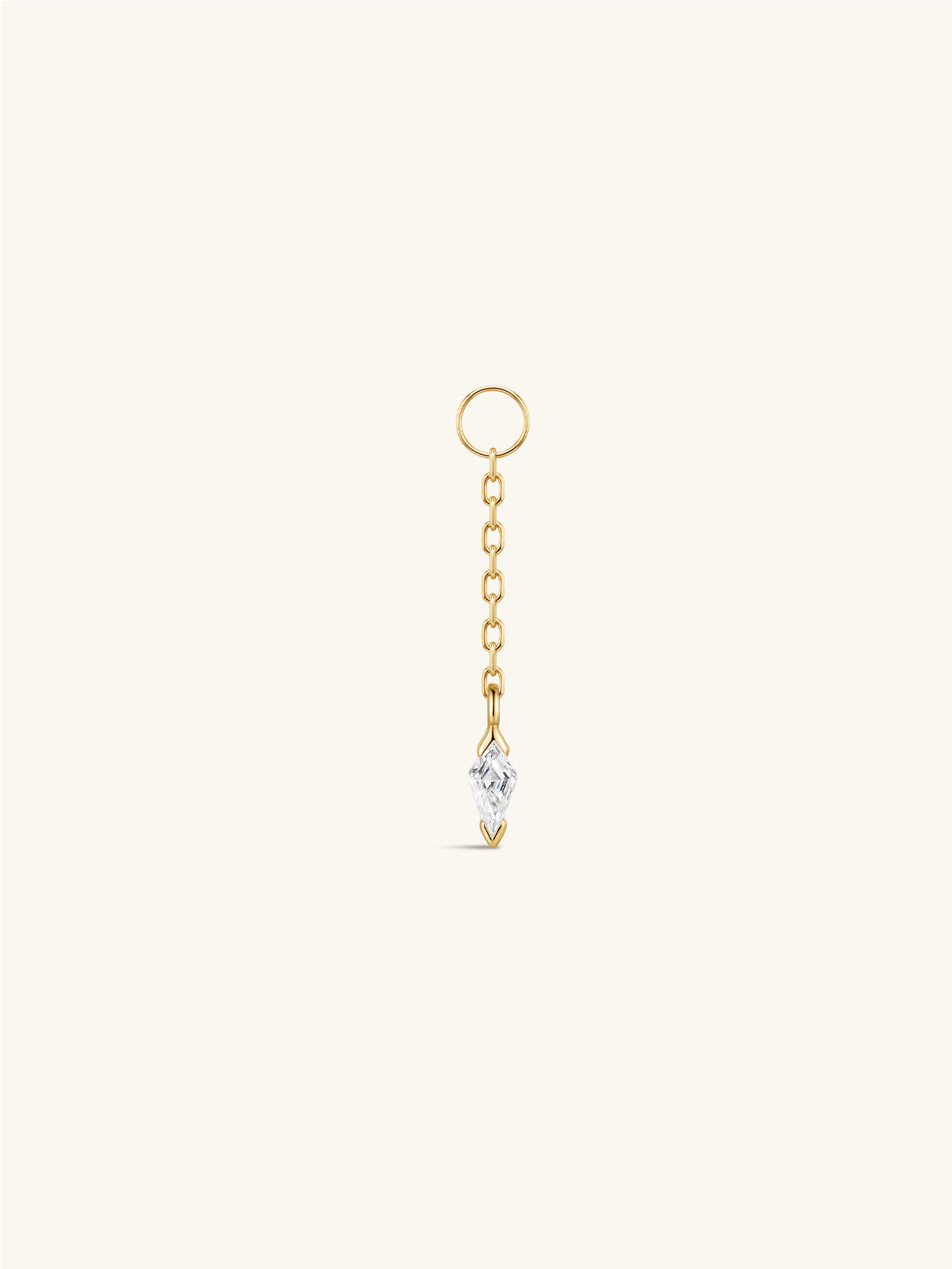 14K solid gold kite drop detachable charm, long chain with kite cut CZ pendant, ear hoop accessory on cream neutral background