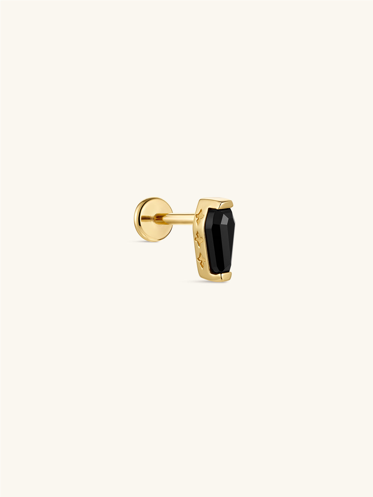 14K solid gold black coffin flat back labret stud, black onyx goth coffin cartilage piercing earring, front view on cream neutral background