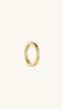 Single KOSINER 14K solid gold minimalist clicker hoop isolated on off-white background, engraved 14K marking on inner band, smooth polished round hinged piercing ring