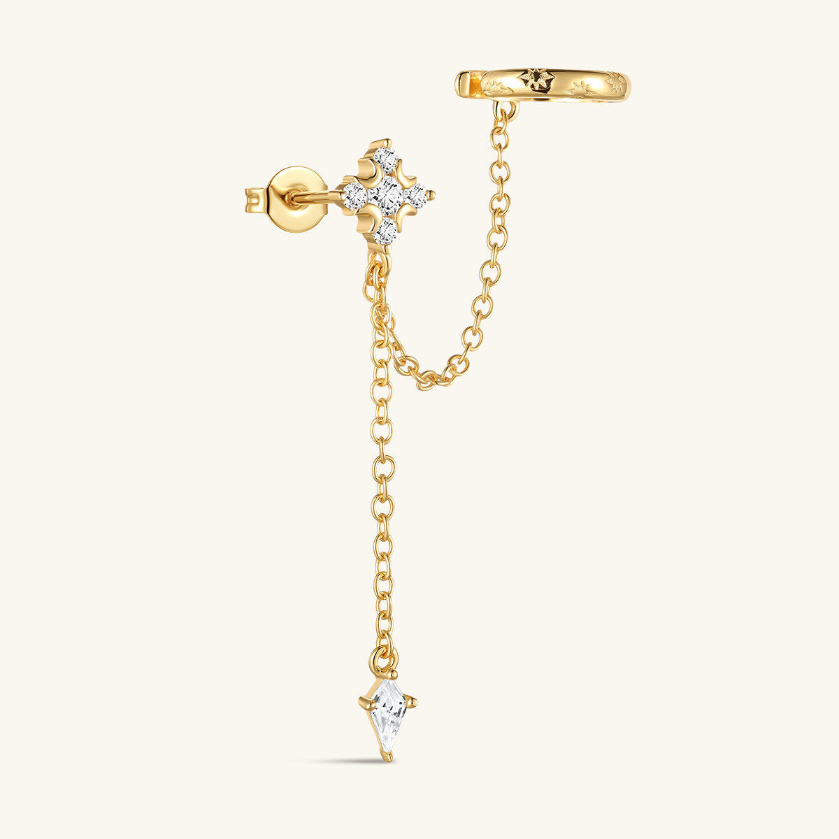Close-up of KOSINER Rising Star left-ear chain earring connecting a star and moon stud to an ear cuff