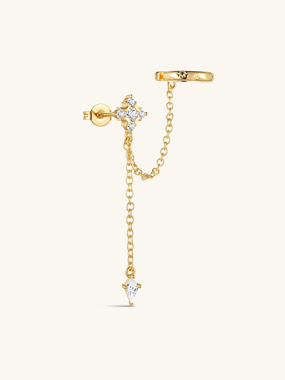 Close-up of KOSINER Rising Star left-ear chain earring connecting a star and moon stud to an ear cuff
