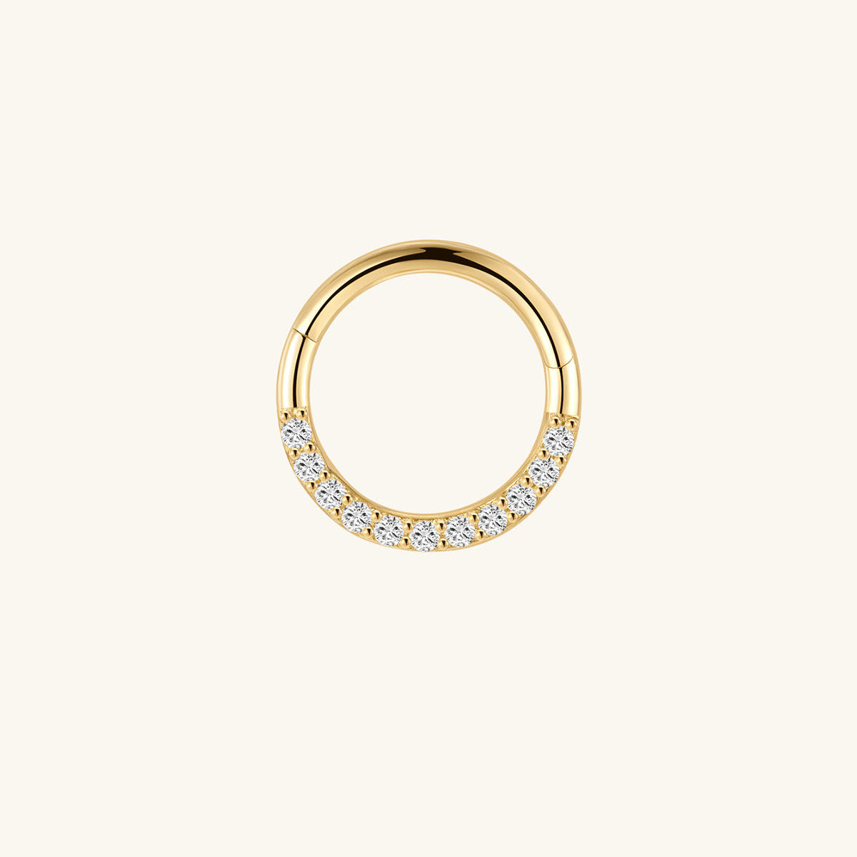 14K solid gold hoop earring with pave cubic zirconia crystals on a light background.