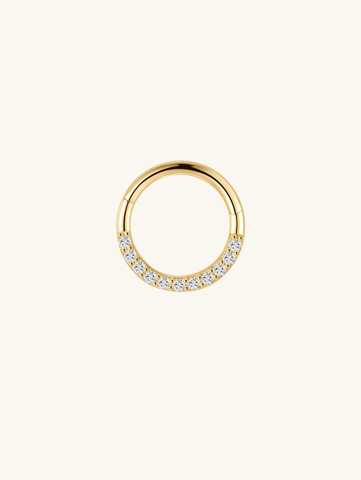 14K solid gold hoop earring with pave cubic zirconia crystals on a light background.