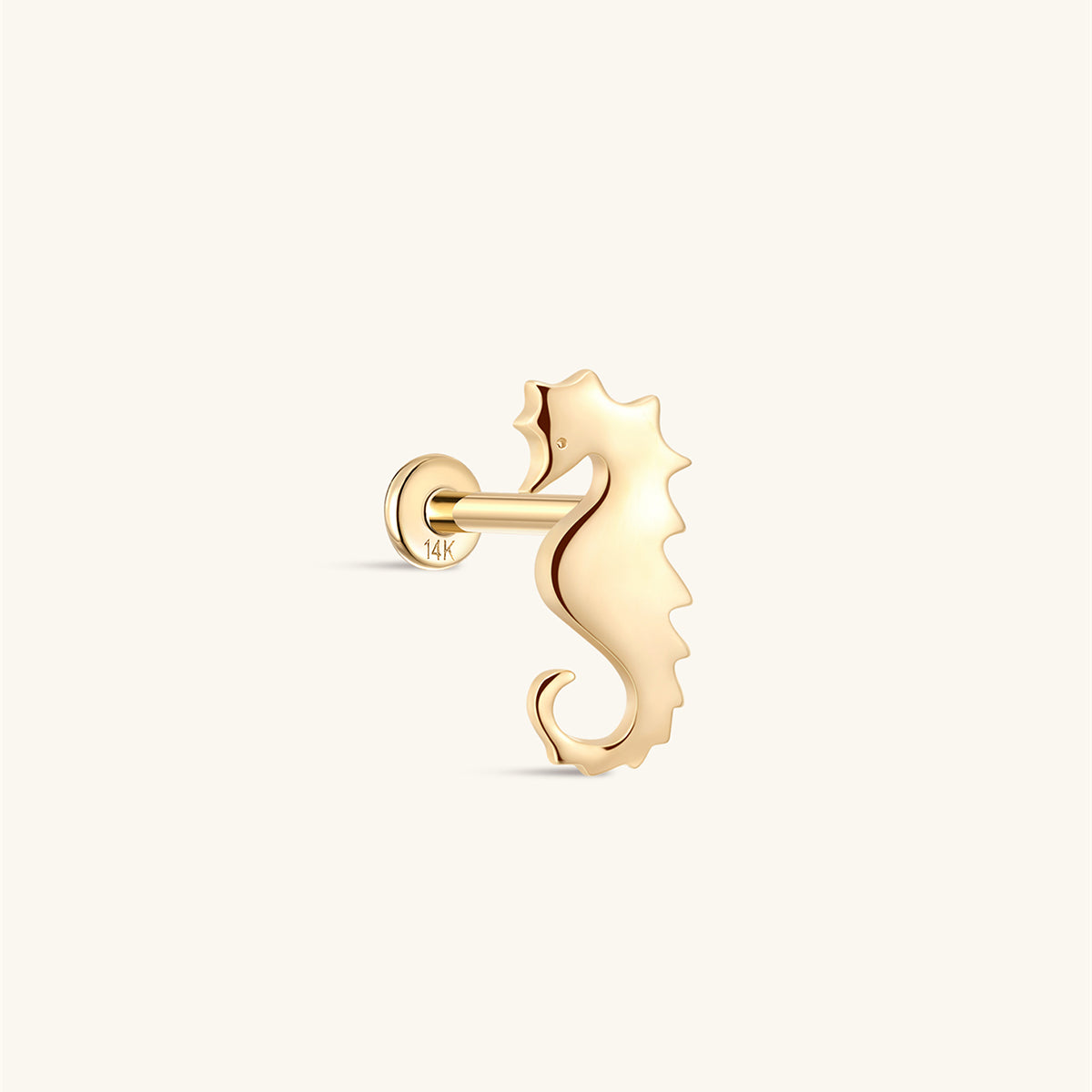 Side profile shot of KOSINER 14K solid gold whale flat back stud, internally threaded post stamped 14K, polished 3D whale silhouette with detailed texture on the body, cute ocean animal cartilage piercing stud