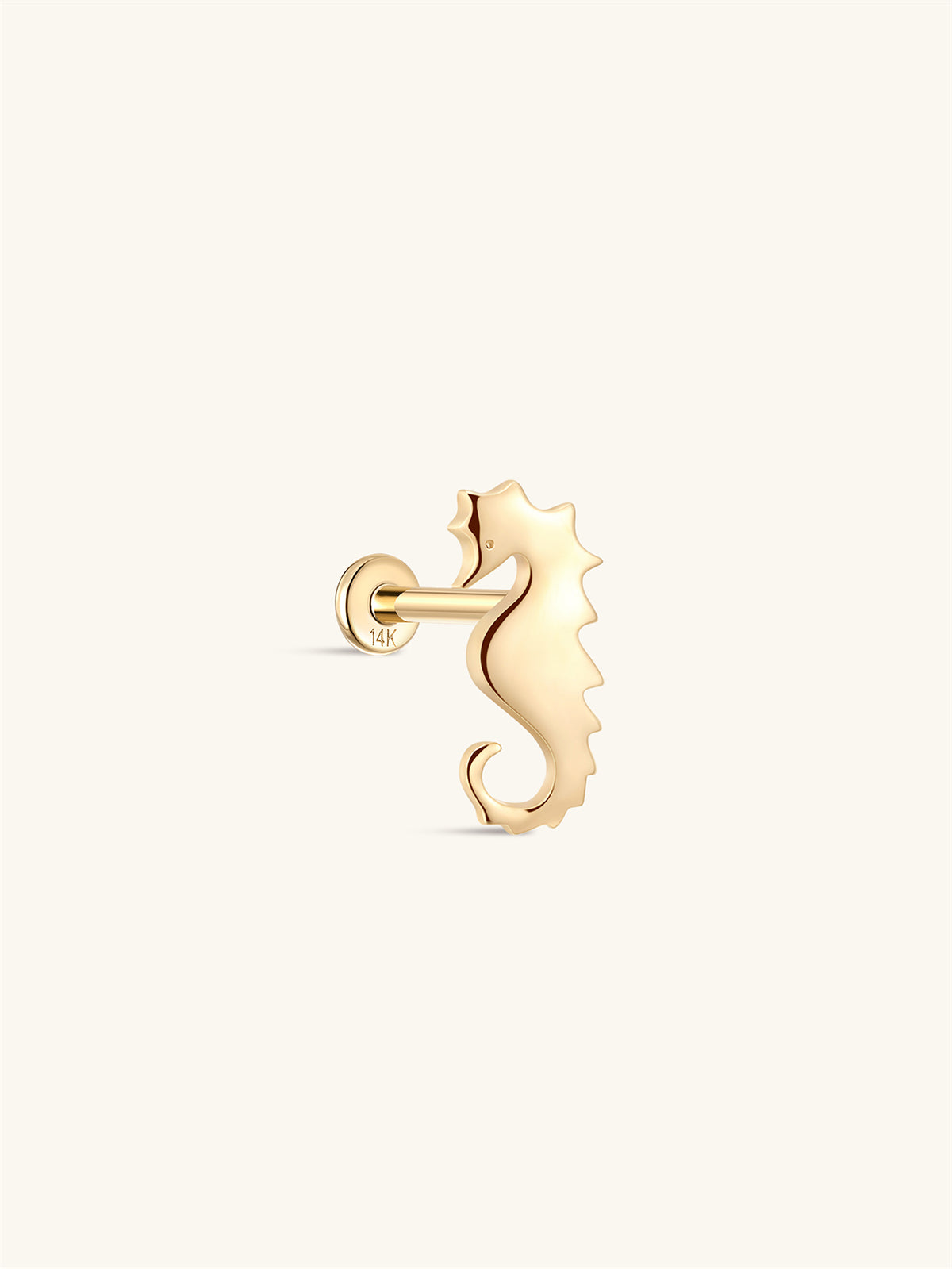 Side profile shot of KOSINER 14K solid gold whale flat back stud, internally threaded post stamped 14K, polished 3D whale silhouette with detailed texture on the body, cute ocean animal cartilage piercing stud