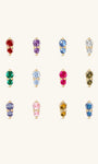 Complete 12-month dual birthstone flat back stud collection on off-white background, 14K gold prong-set two-stone design, each row corresponds to a monthly birthstone CZ hue from January Garnet to December Tanzanite