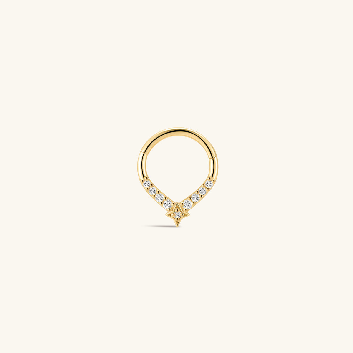 KOSINER Starlight four-point star teardrop daith clicker hoop on plain white background, smooth 14K gold teardrop silhouette, row of round pavé CZ gemstones, dangling four-point star accent with center crystal, secure hinged clicker construction for easy daith insertion