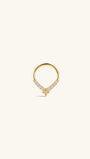 KOSINER Starlight four-point star teardrop daith clicker hoop on plain white background, smooth 14K gold teardrop silhouette, row of round pavé CZ gemstones, dangling four-point star accent with center crystal, secure hinged clicker construction for easy daith insertion