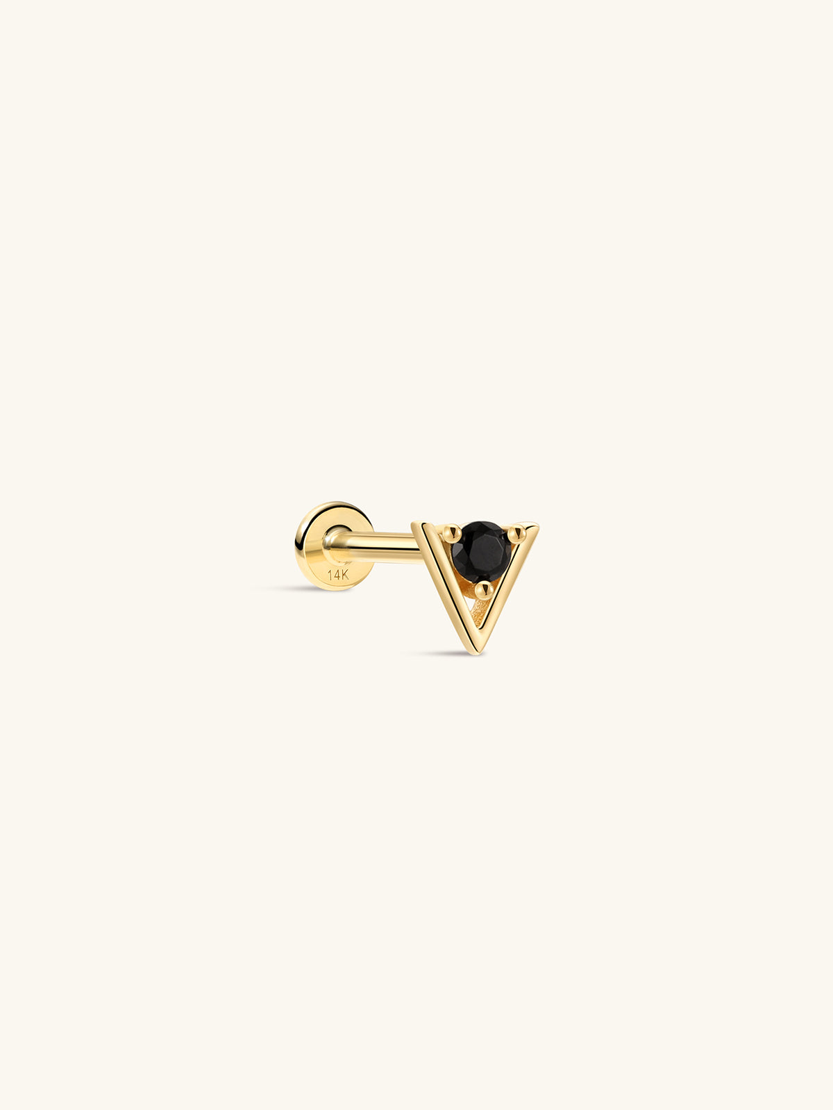 Side profile shot of KOSINER Puzzle 14K solid gold dual triangle flat back stud, internally threaded post marked 14K, prong-set rhombus shape split with top black triangle cz and bottom clear triangle cz, edgy black & white contrast geometric cartilage piercing stud