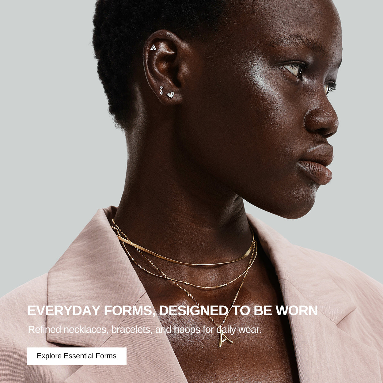 Woman wearing necklaces and earrings with text about everyday jewelry.