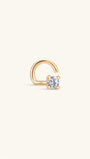 Single KOSINER 14K solid gold twist hook nose stud, four-prong set round clear stone, engraved 14K marking on curved post, isolated on plain white background