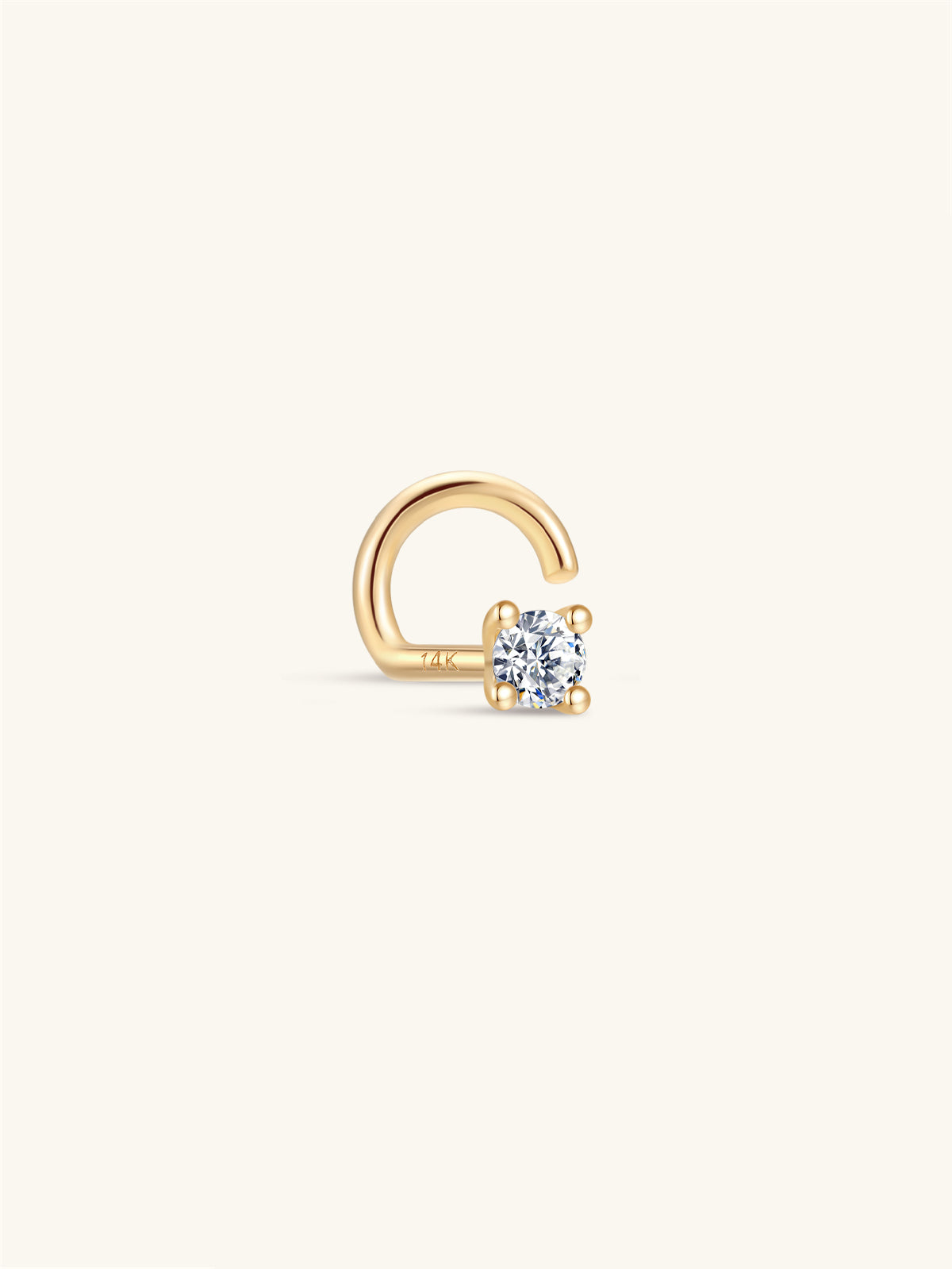 Single KOSINER 14K solid gold twist hook nose stud, four-prong set round clear stone, engraved 14K marking on curved post, isolated on plain white background