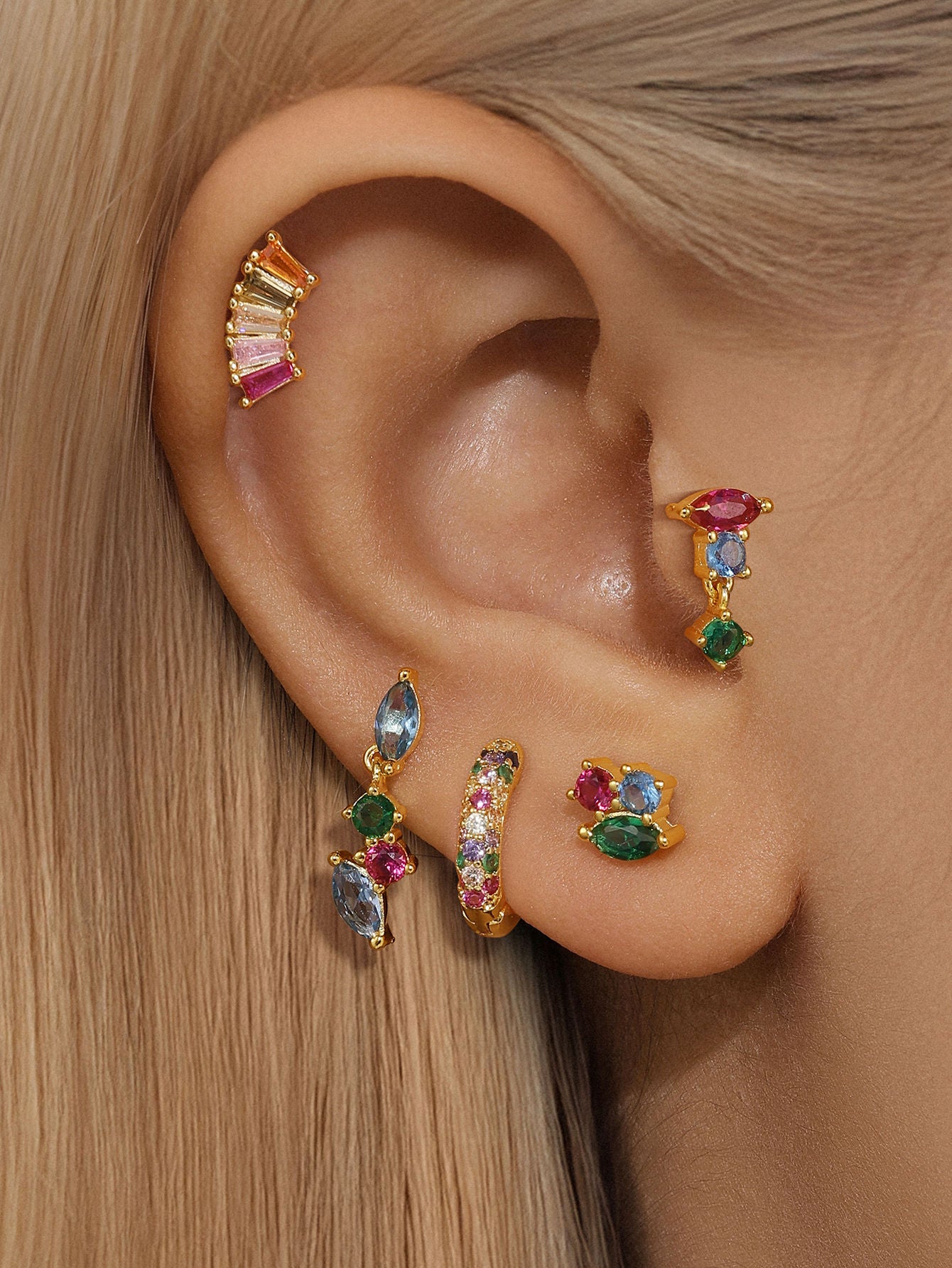 Gold plated 925 sterling silver earrings with colorful cubic zirconia, styled as an ear stack.