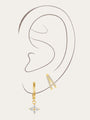 Earring set: 18kt gold plated sterling silver with geometric cubic zirconia studs, hoops, and drops.