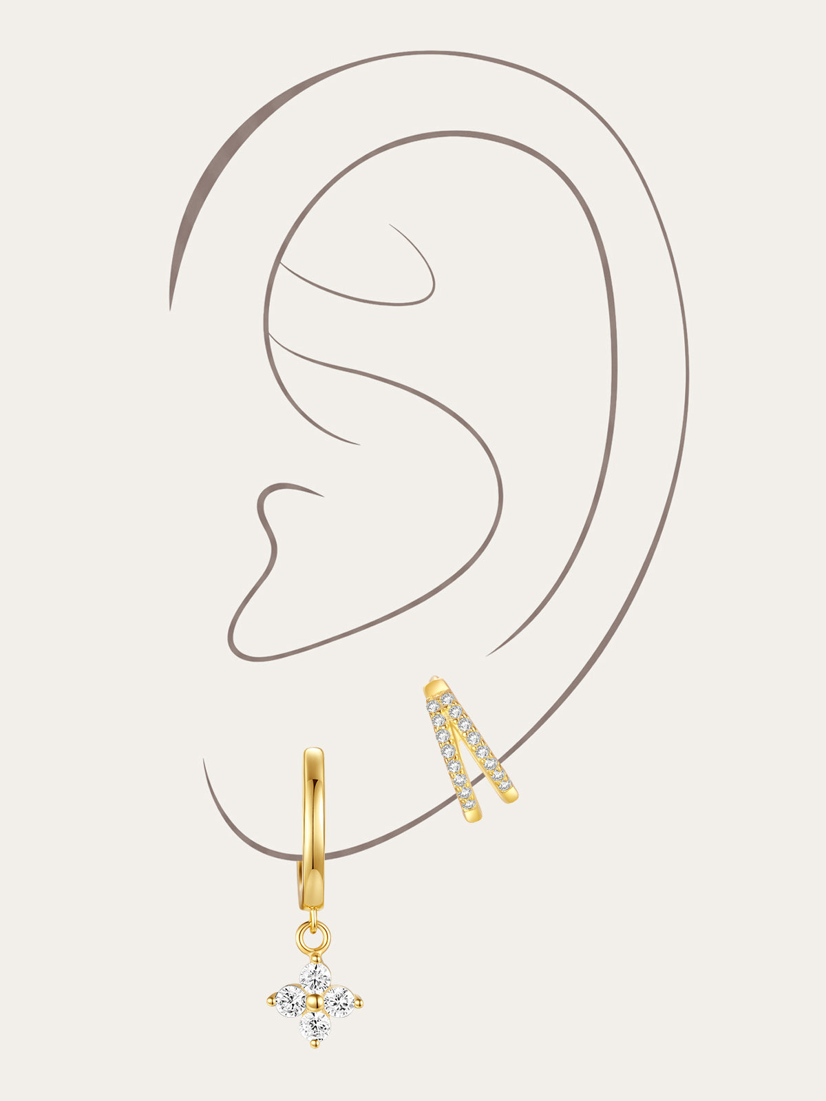 Earring set: 18kt gold plated sterling silver with geometric cubic zirconia studs, hoops, and drops.