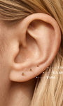 KOSINER flat back post on ear, 5/6.5/8mm sizes shown on lobe piercings for fit comparison