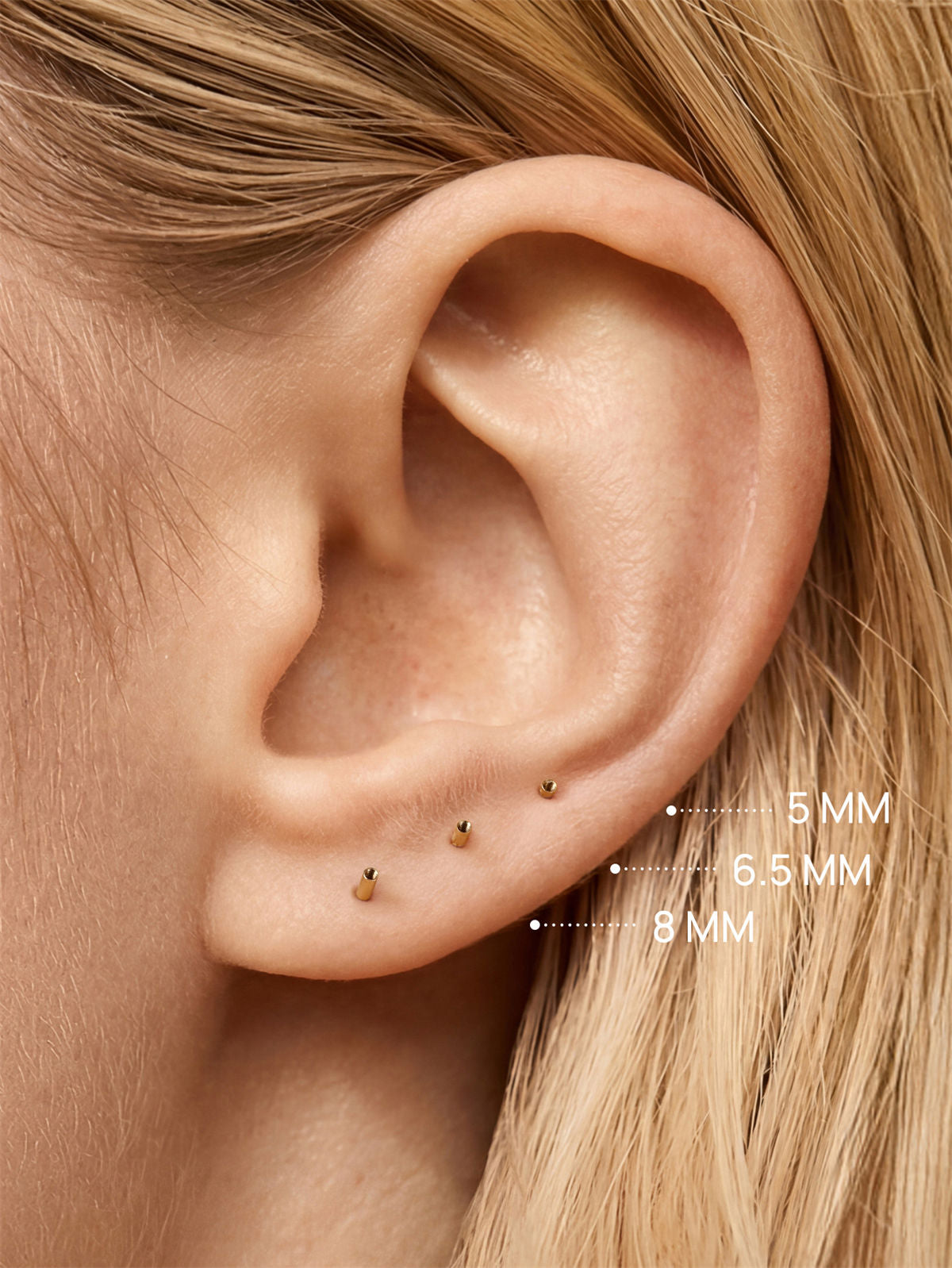 KOSINER flat back post on ear, 5/6.5/8mm sizes shown on lobe piercings for fit comparison