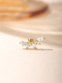 18kt gold plated sterling silver ear stud with marquise and round cubic zirconia stones, floral design.