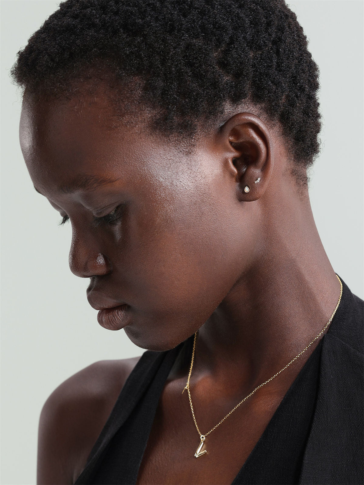 KOSINER polished gold finish with sparkling pave stones, delicate look for all occasions