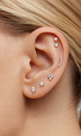 KOSINER Elegant three-stone flat back stud, forming a delicate triangular shape, perfect for subtle ear styling