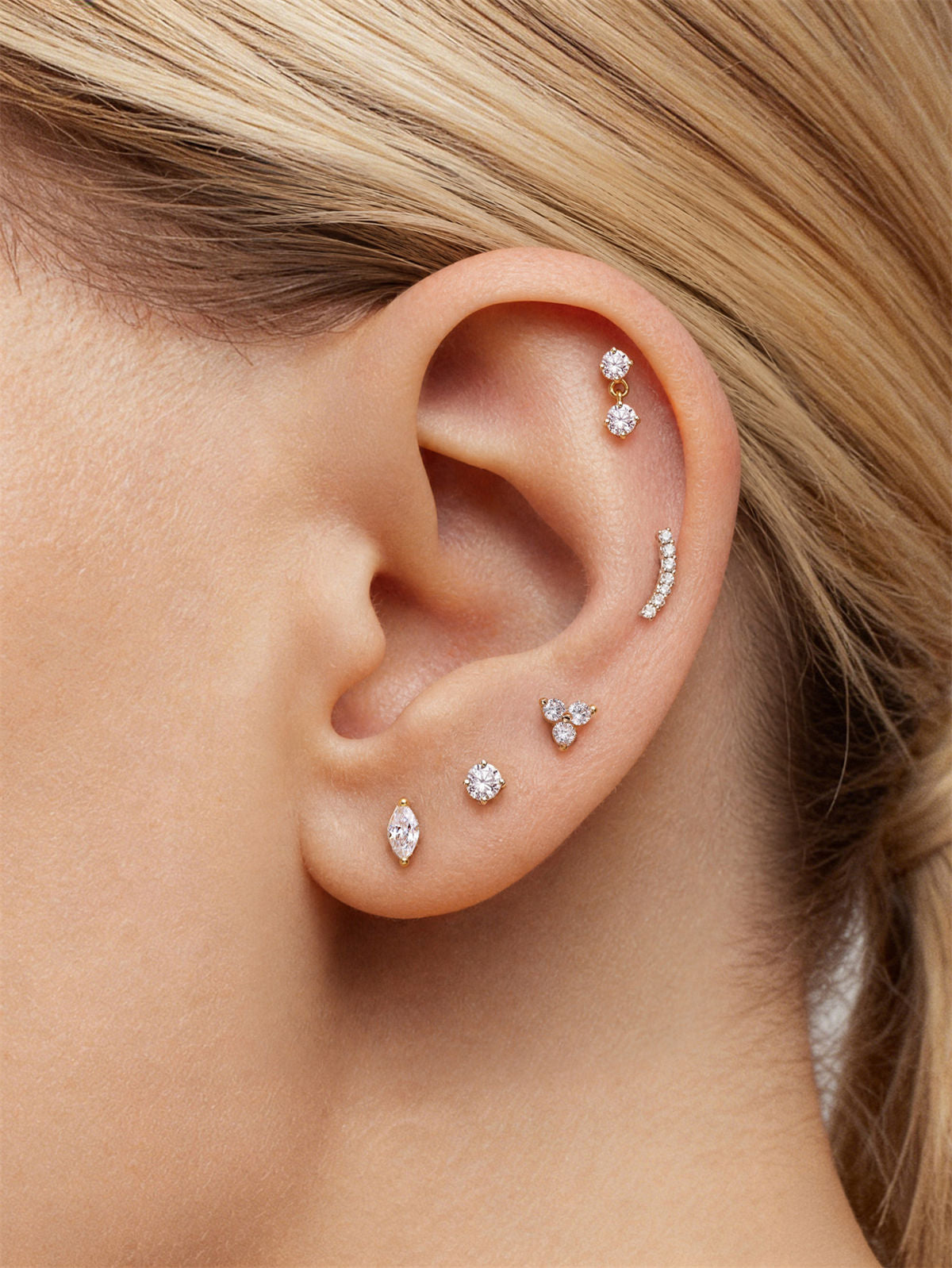 KOSINER Elegant three-stone flat back stud, forming a delicate triangular shape, perfect for subtle ear styling