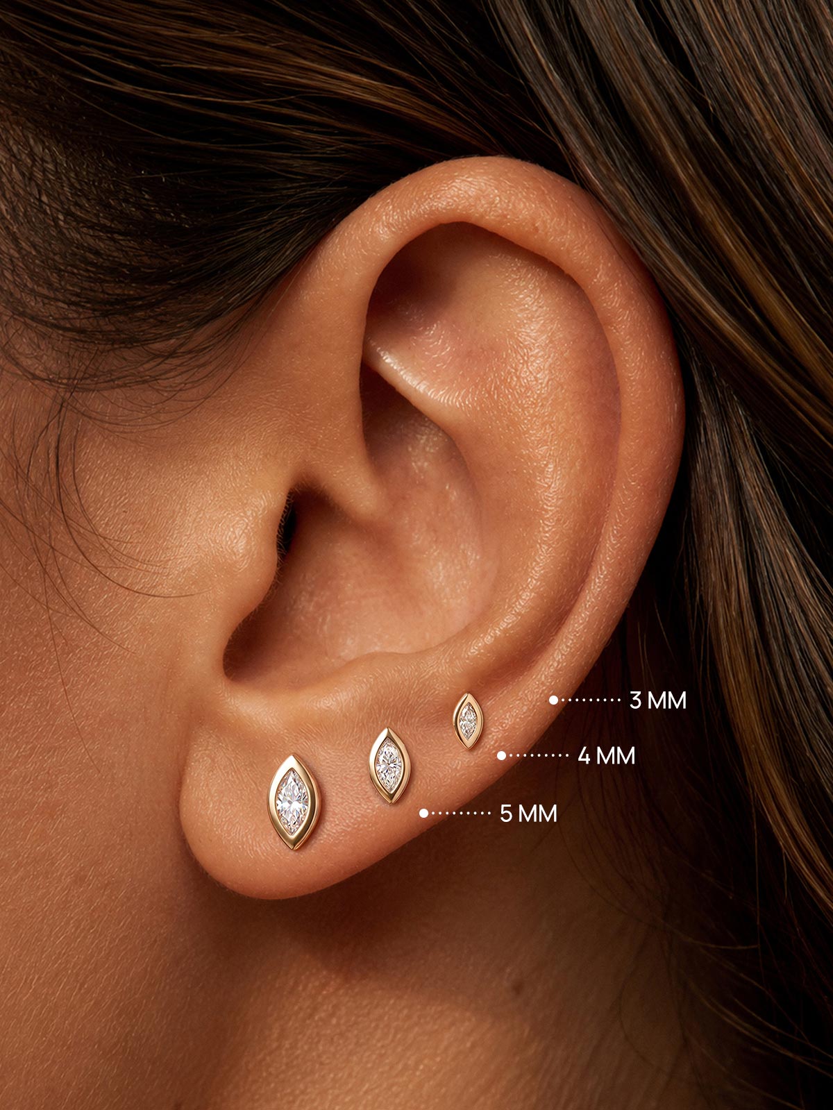 KOSINER marquise lab-grown diamond flat back studs in 3mm, 4mm and 5mm sizes on ear