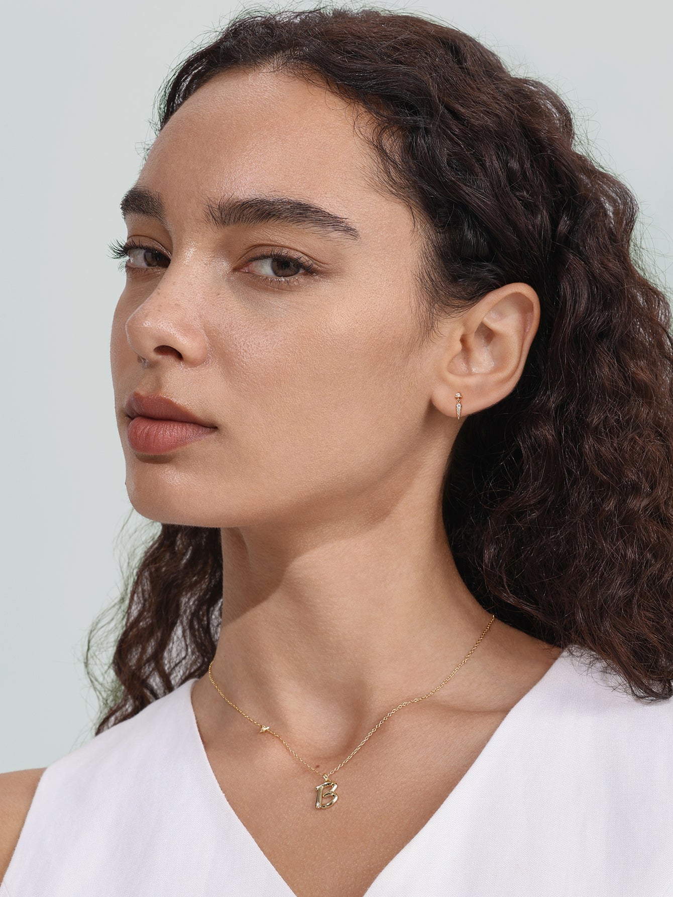 Goujon à dos plat avec rivet CZ en or massif 14 carats