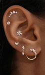 Ear stacking look with assorted KOSINER 14K solid gold marquise disc cartilage piercing studs, multi-position helix lobe layered ear jewelry styling