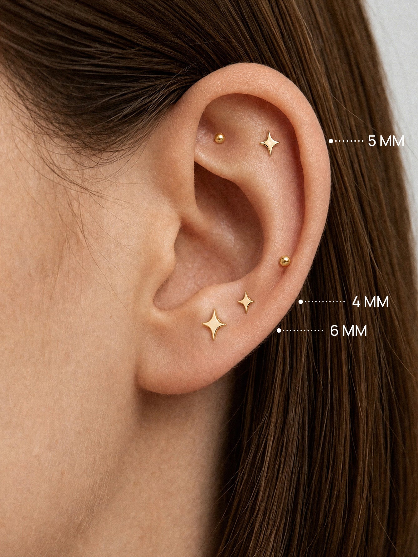Piercing de oreja brillante con estrella brillante de oro macizo de 14 quilates