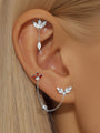 925 Sterling silver 18K gold plated chain earrings with cubic zirconia. Leaf stud connects to red flaming wings stud.