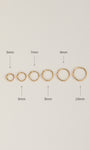 Top-down flat lay showing full size lineup of KOSINER diamond clicker hoops: 5mm, 6mm, 7mm, 8mm, 9mm, 10mm diameter labeled clearly on neutral light background