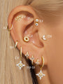 Gold-plated 925 sterling silver earrings with AAAAA cubic zirconia on an ear. Various styles shown.