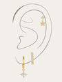 Gold sterling silver earrings with flower, butterfly, and hoop designs with zircon stones, worn on ear for styling.