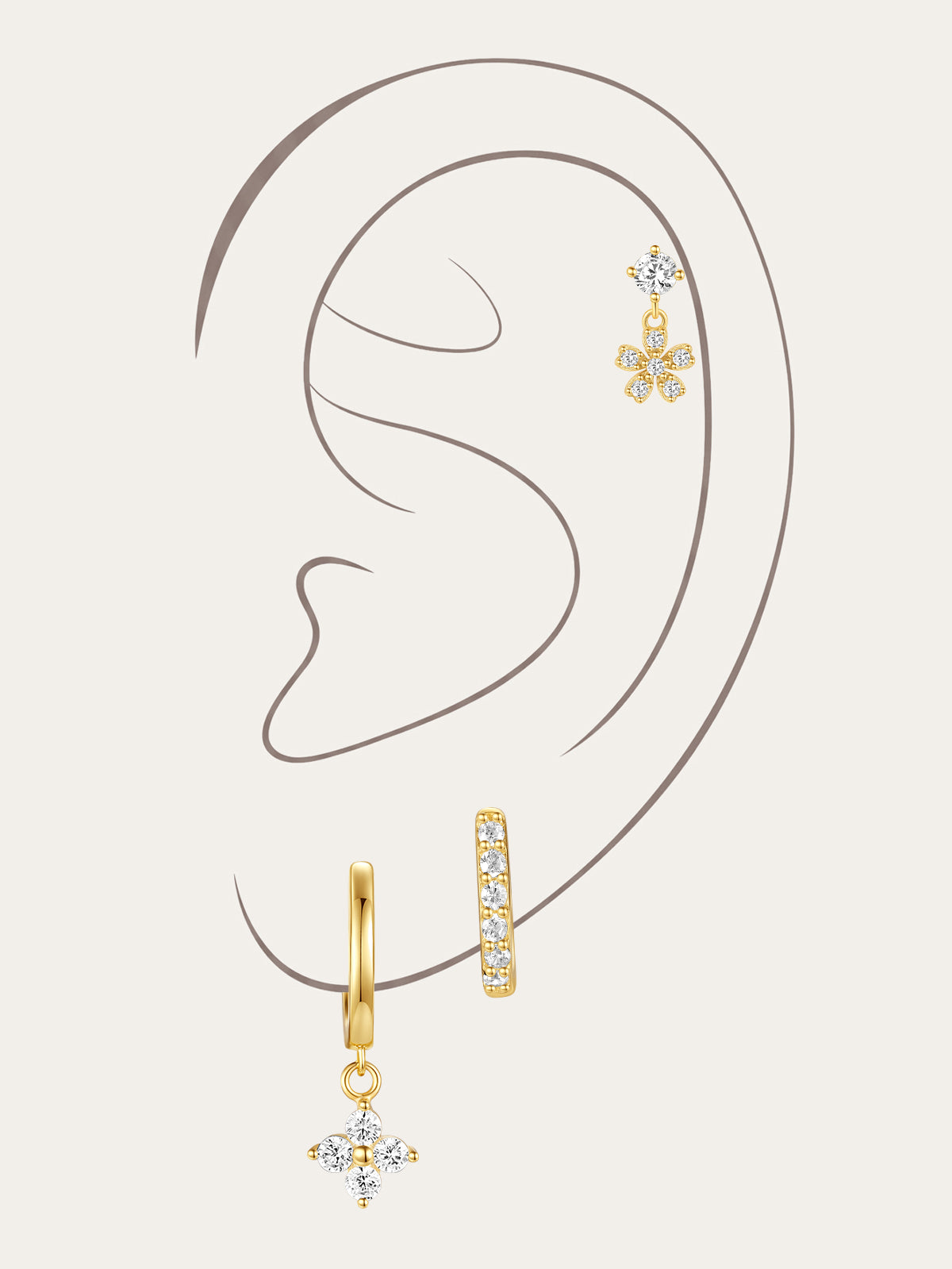 Gold sterling silver earrings with flower, butterfly, and hoop designs with zircon stones, worn on ear for styling.