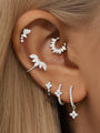 Sterling silver earrings with pave cubic zirconia: flower stud, leaf cuff, daith hoop, and drop earrings, product page.