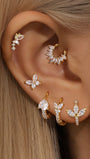 Gold-plated 925 sterling silver earring set featuring butterfly, flower, and leaf designs with cubic zirconia on ear.