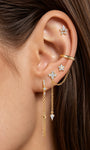 Angled view of KOSINER Rising Star gold-plated chain hoop with clear stones, an eight-pointed star and a hanging chain loop