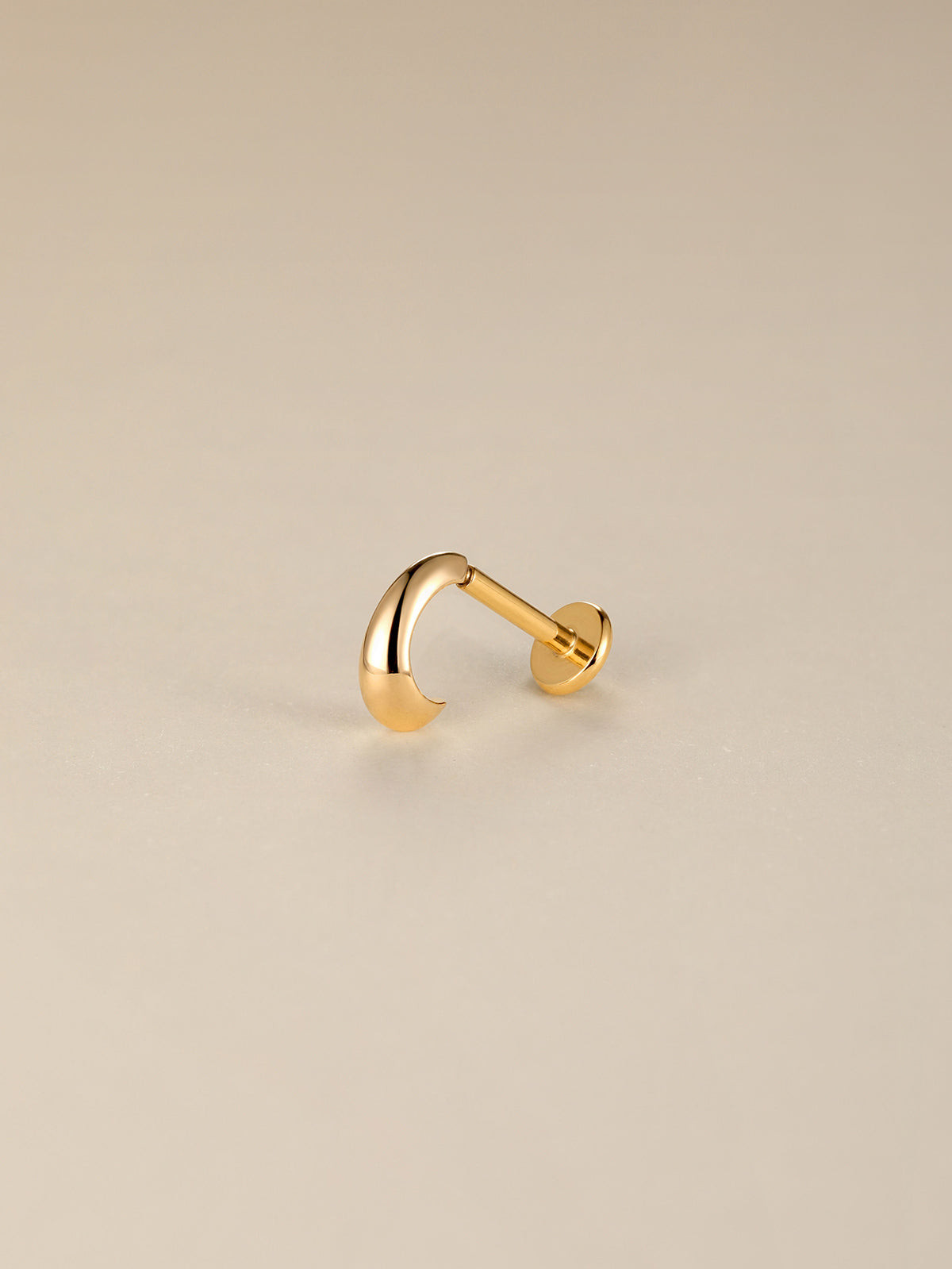 KOSINER 14K solid gold minimalist C-curve flat back stud displayed on reflective neutral backdrop, text overlay: 14K Solid Gold, Waterproof, Hypoallergenic, Not Plated premium body piercing jewelry