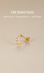 KOSINER 14K solid gold pavé CZ C-curve flat back stud on soft reflective neutral backdrop, text overlay: 14K Solid Gold, Waterproof, Hypoallergenic, Not Plated premium body piercing jewelry