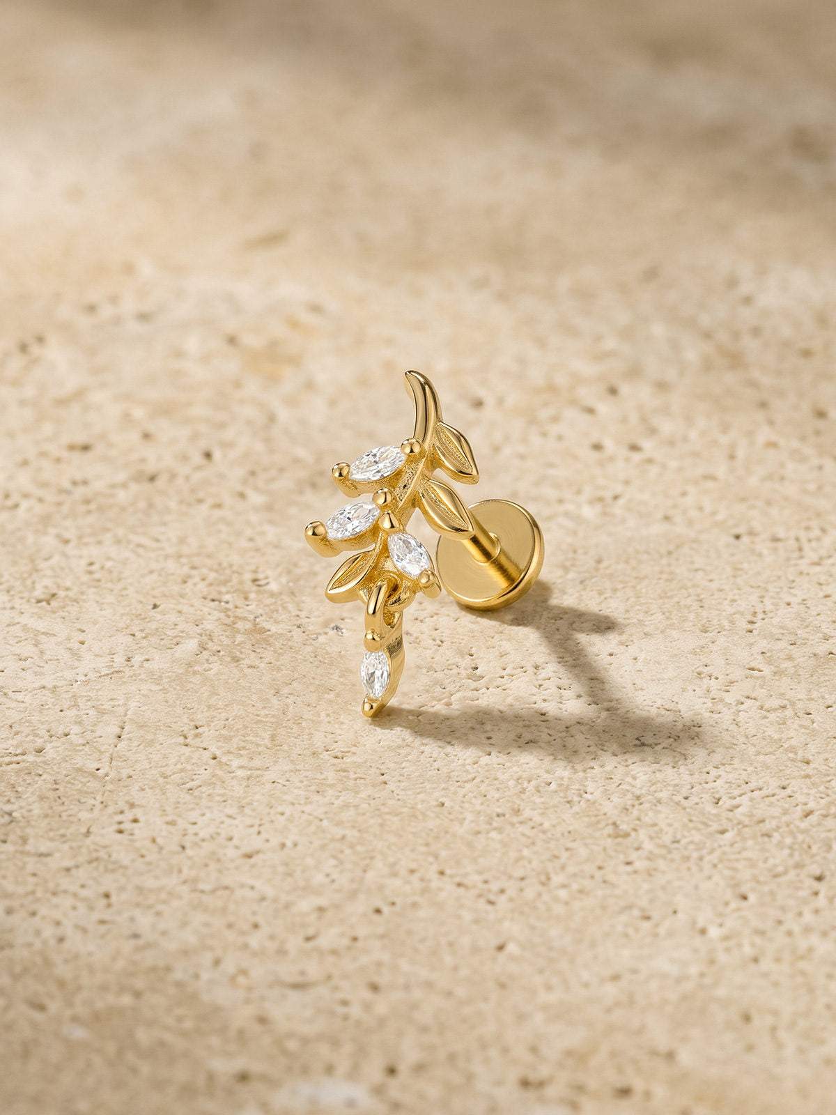 At Dawn olive branch flat back stud with marquise-cut clear stones