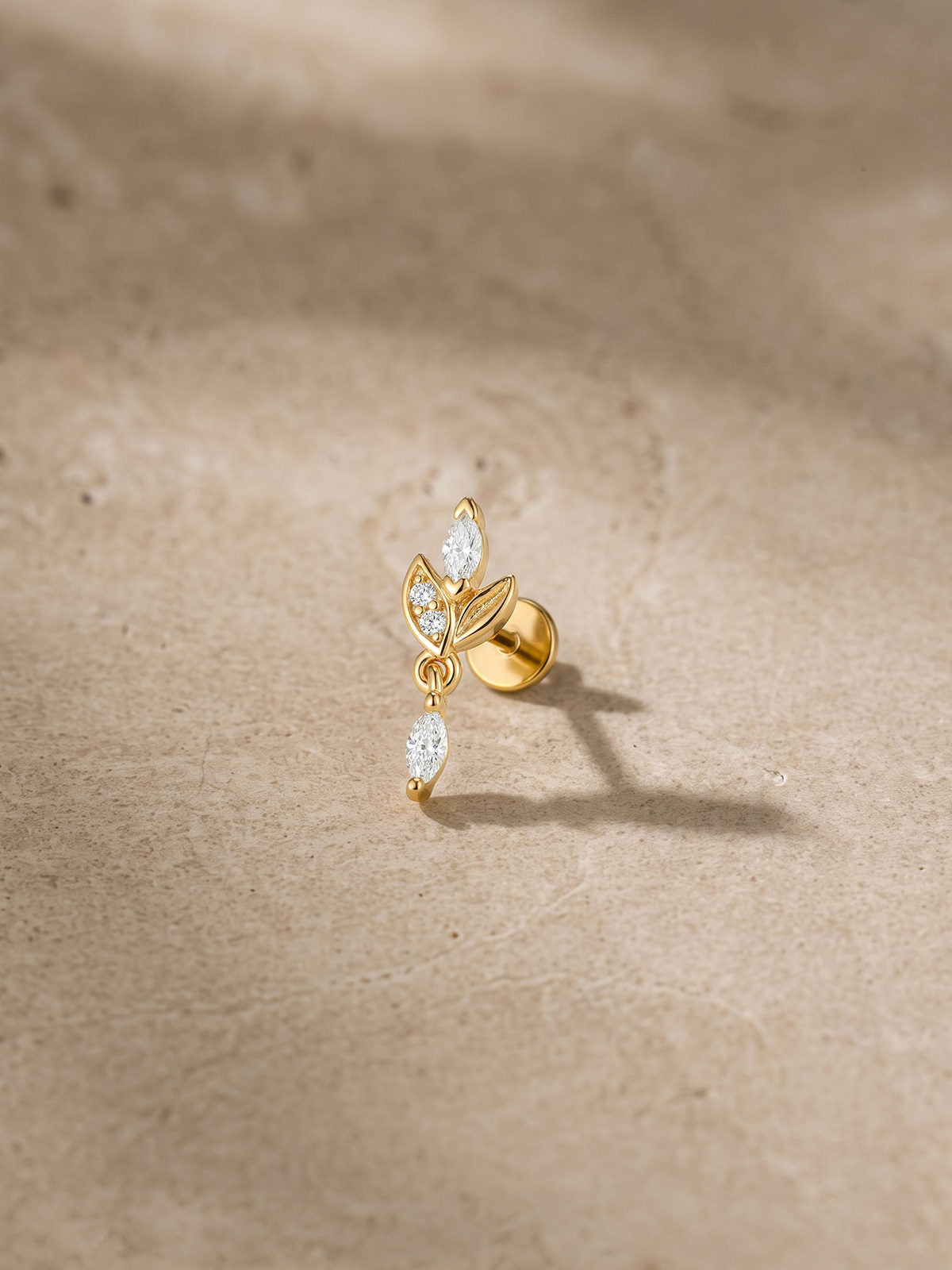 At Dawn olive branch marquise drop flat back stud with sparkling clear stones