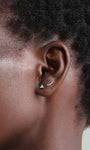 KOSINER 14K solid gold minimalist trinity stud worn solo or layered in curated ear stack